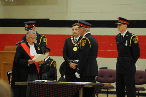 Image of Justice Kent administering the Oaths to Chief Kellner and Deputy Chief Nelson